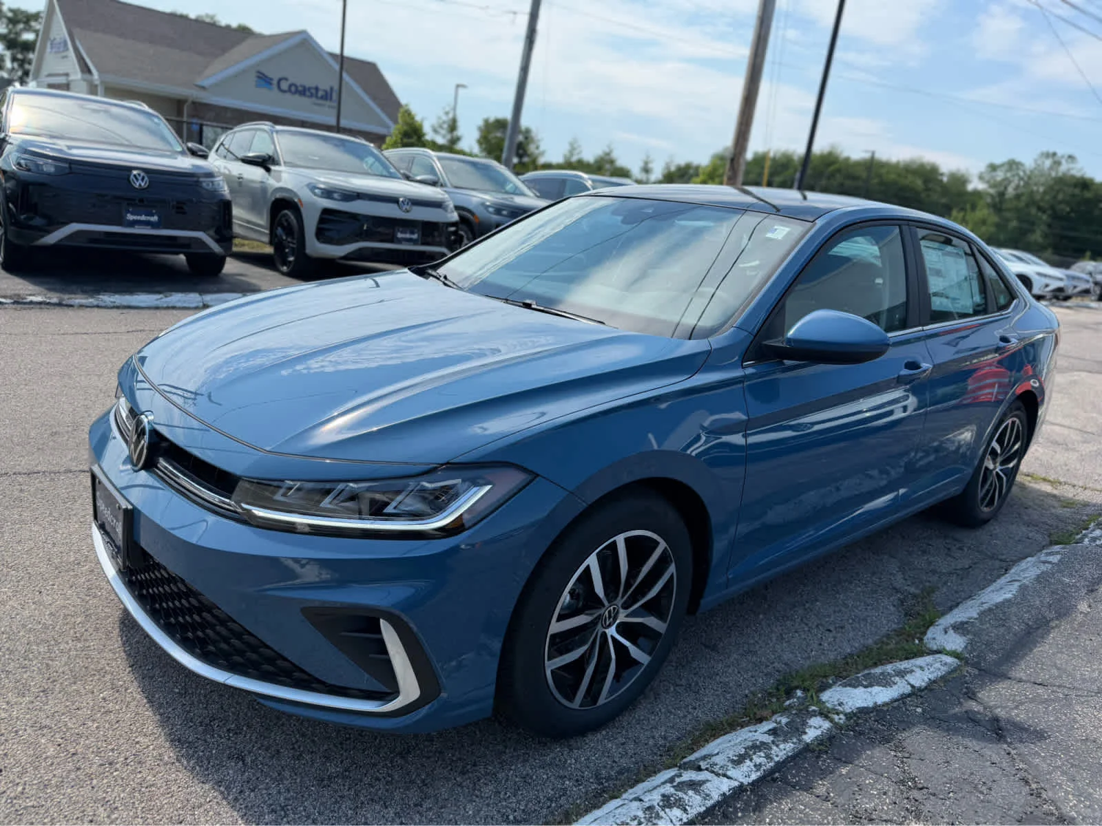New 2026 Monterey Blue Pearl Volkswagen SE image 3