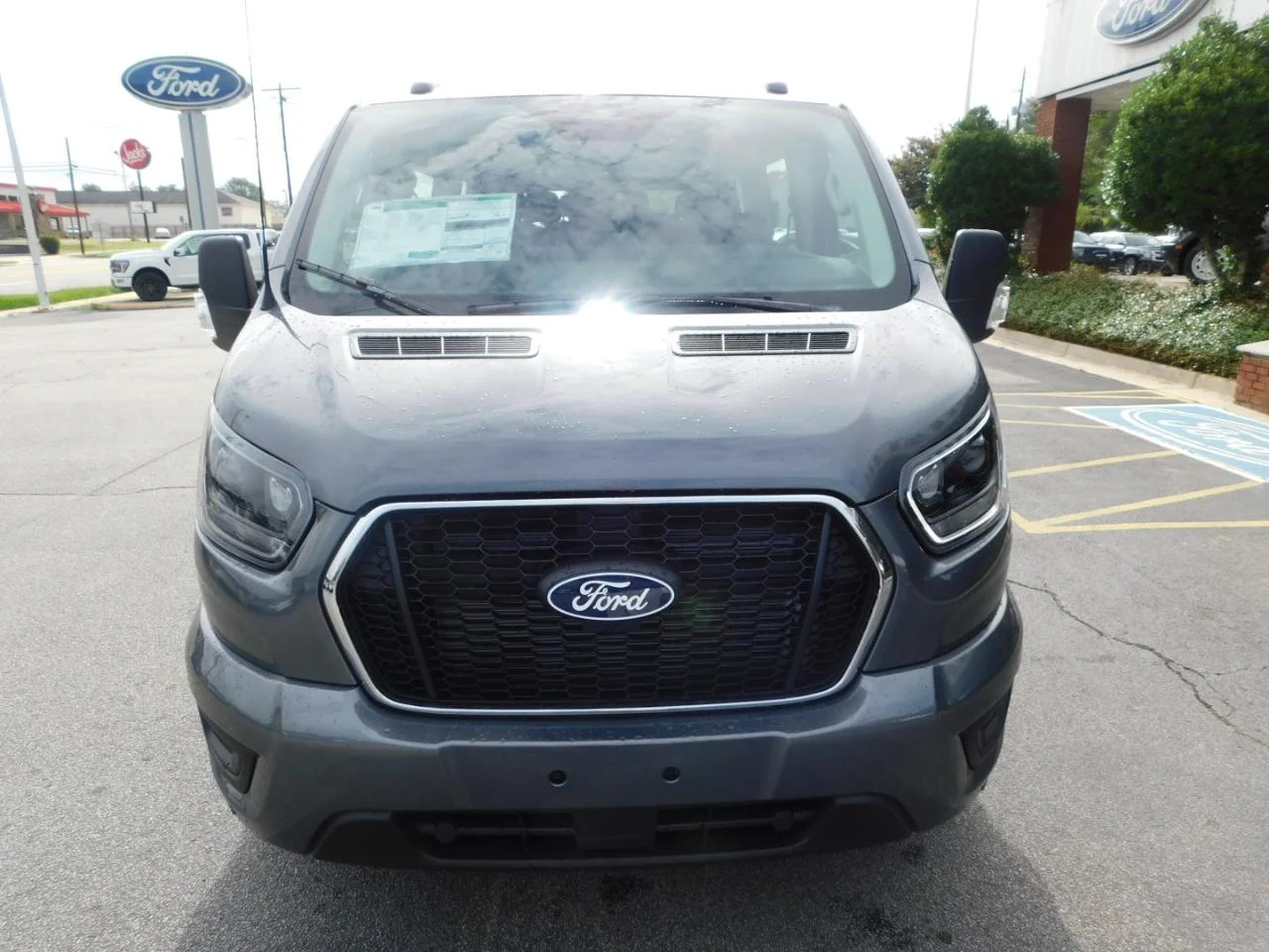 New 2026 Carbonized Gray Metallic Ford Passenger Van XLT image 3