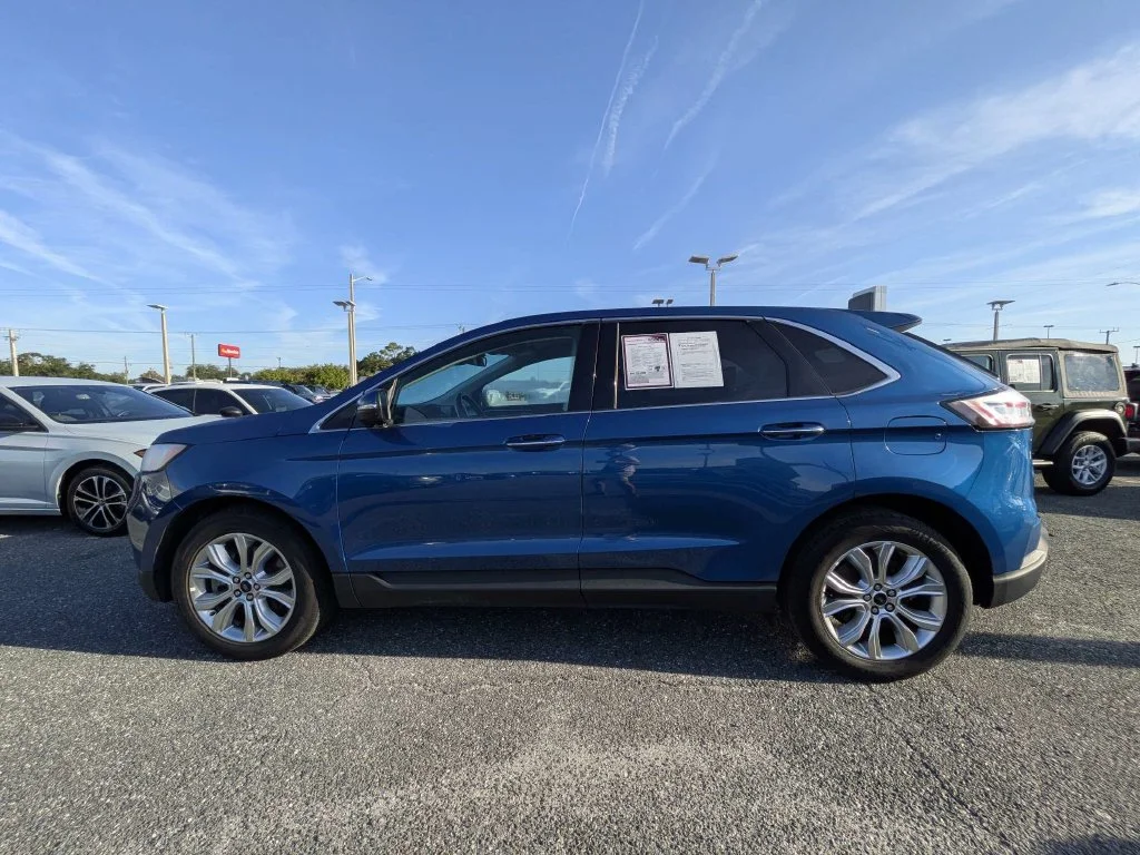 Certified Used 2024 Blue Metallic Ford Titanium image 6