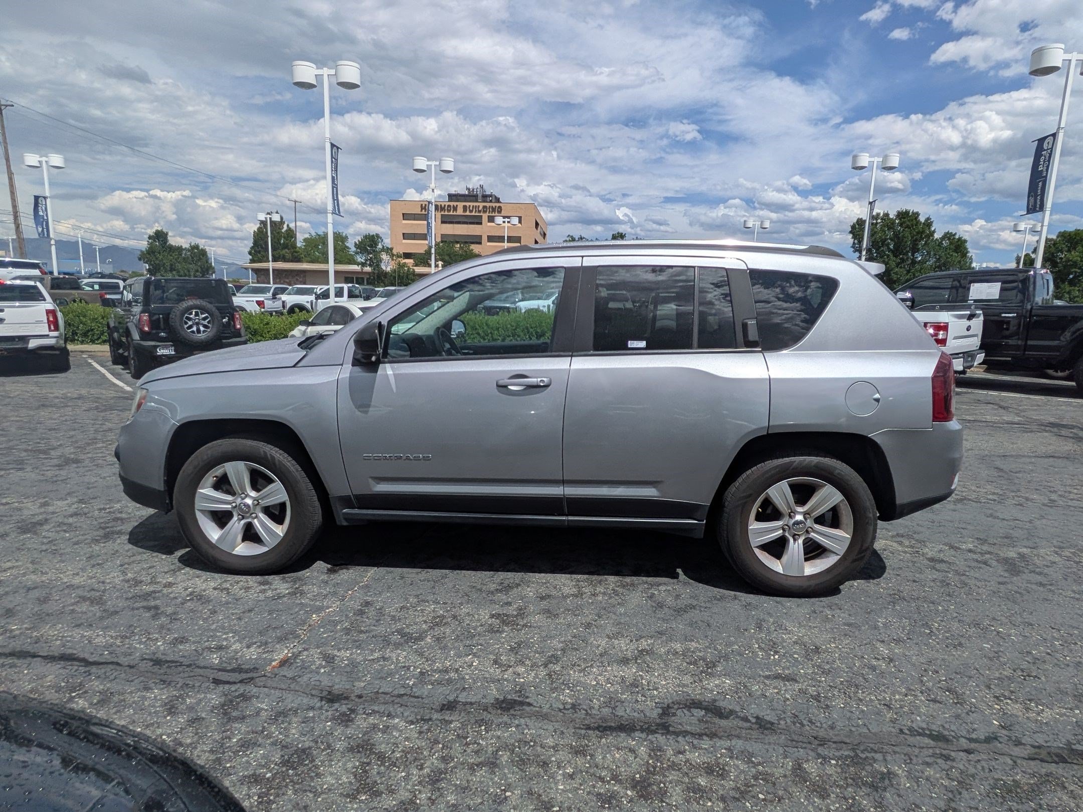 Used 2014 Billet Silver Clearcoat Metallic Jeep Sport image 7