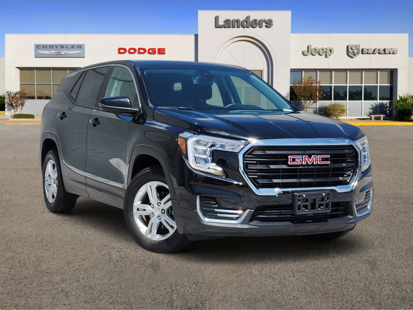 Used 2024 Ebony Twilight Metallic GMC SLE image 1