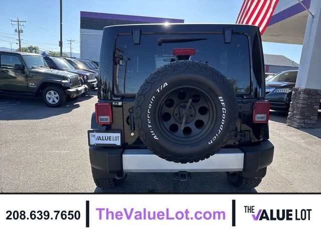 Used 2011 Black Jeep Unlimited Sahara image 5