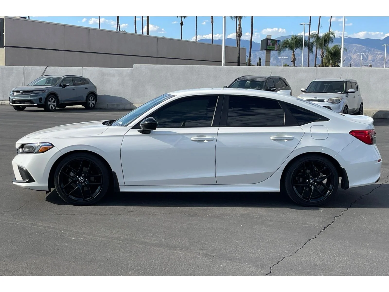 Used 2024 Platinum White Pearl Honda Sport image 2