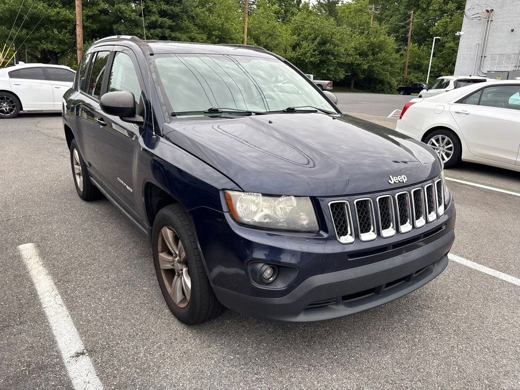 Used 2016 Blue Jeep Sport image 1