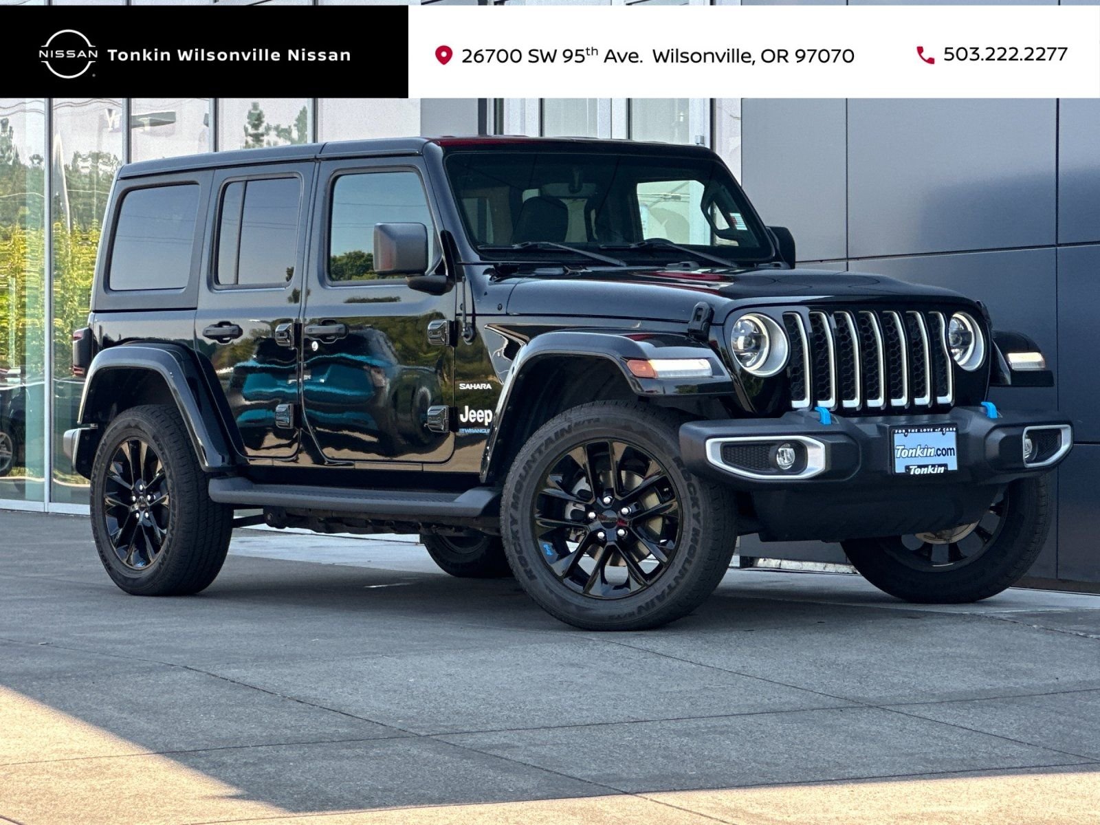 Used 2023 Black Clearcoat Jeep Sahara 4xe image 1