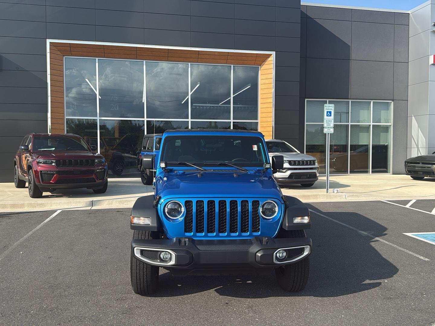 Used 2023 Hydro Blue Pearlcoat Jeep Sport image 2