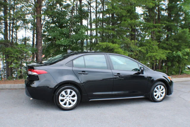 Used 2025 Midnight Black Metallic Toyota LE image 2
