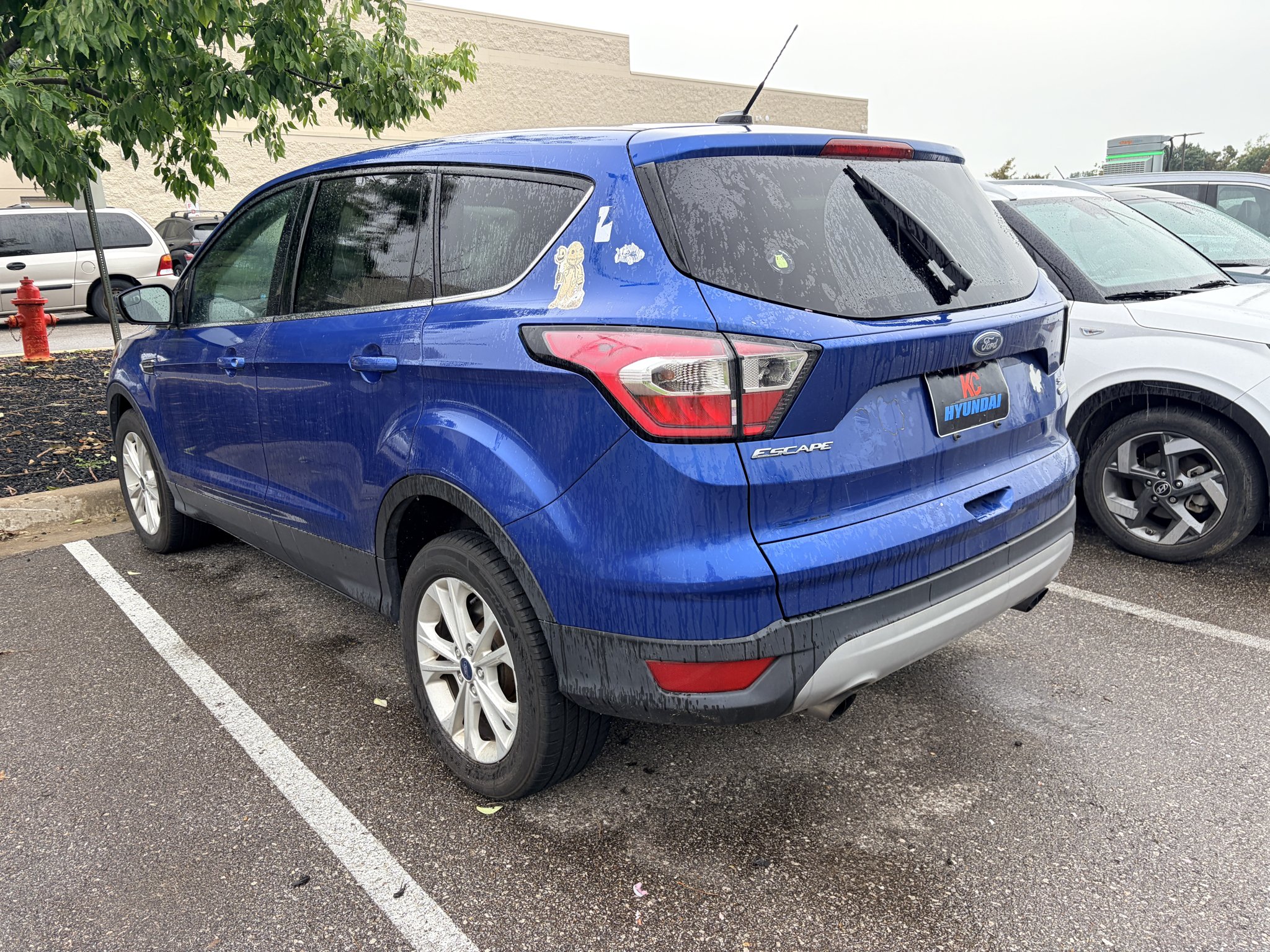 Used 2017 Ruby Red Metallic Tinted Clearcoat Ford SE image 3
