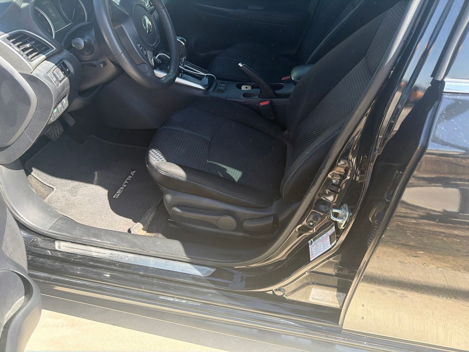 Used 2017 Super Black Nissan SR image 6