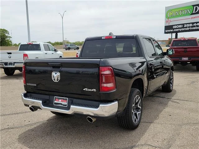 Used 2024 Diamond Black Crystal Pearlcoat RAM Laramie 4x4 Crew Cab 144.5 in. WB image 3