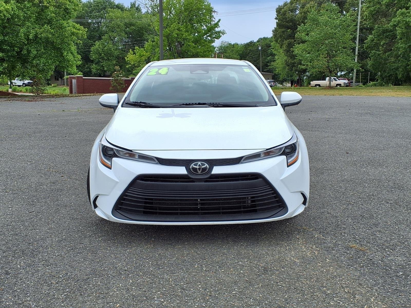 Used 2024 Midnight Black Metallic Toyota LE image 8