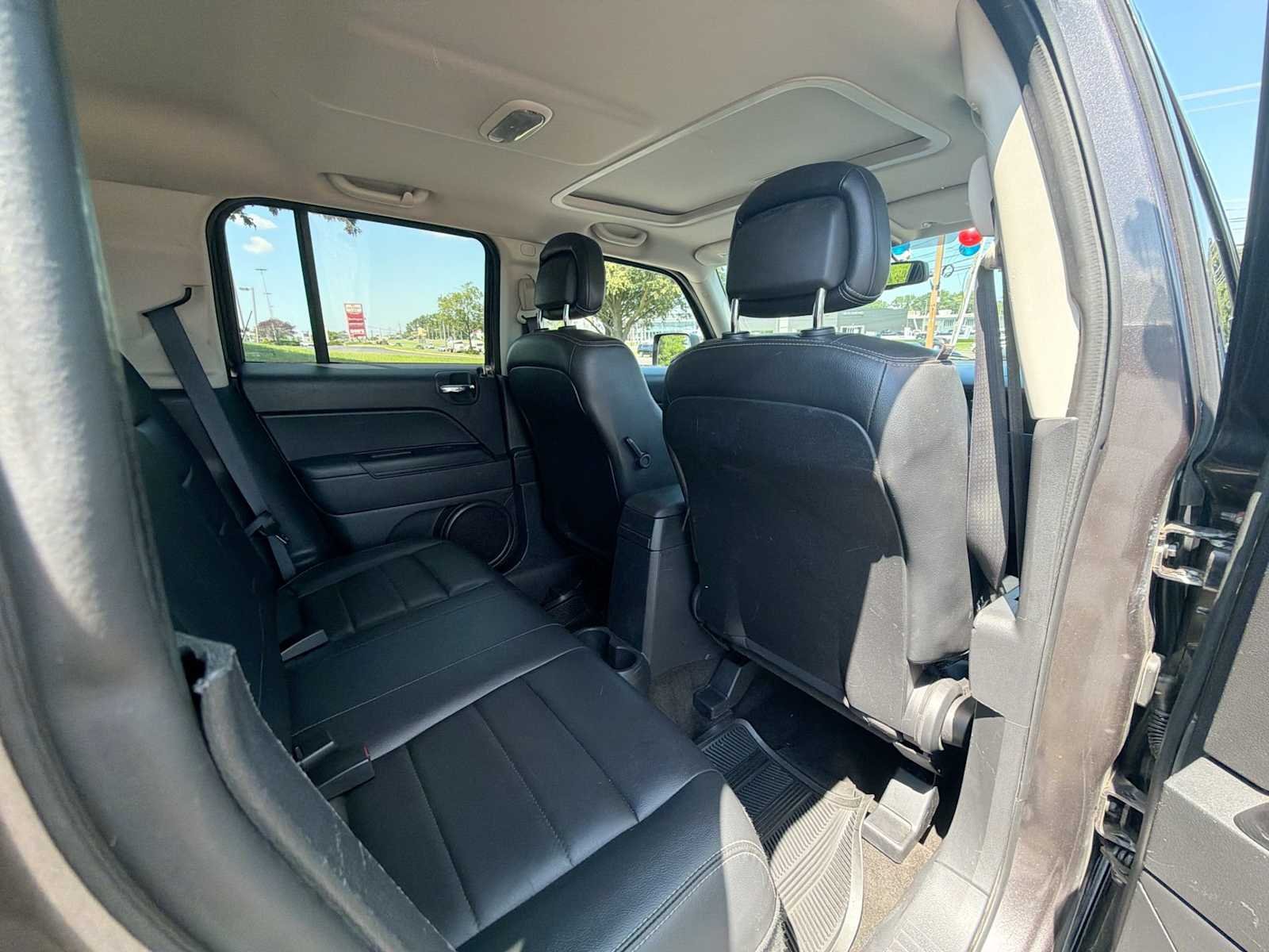 Used 2016 Granite Crystal Metallic Clearcoat Jeep High Altitude Edition image 14