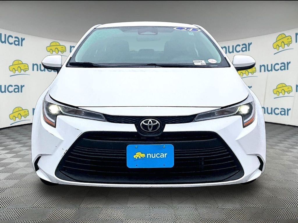 Used 2024 White Toyota LE image 2