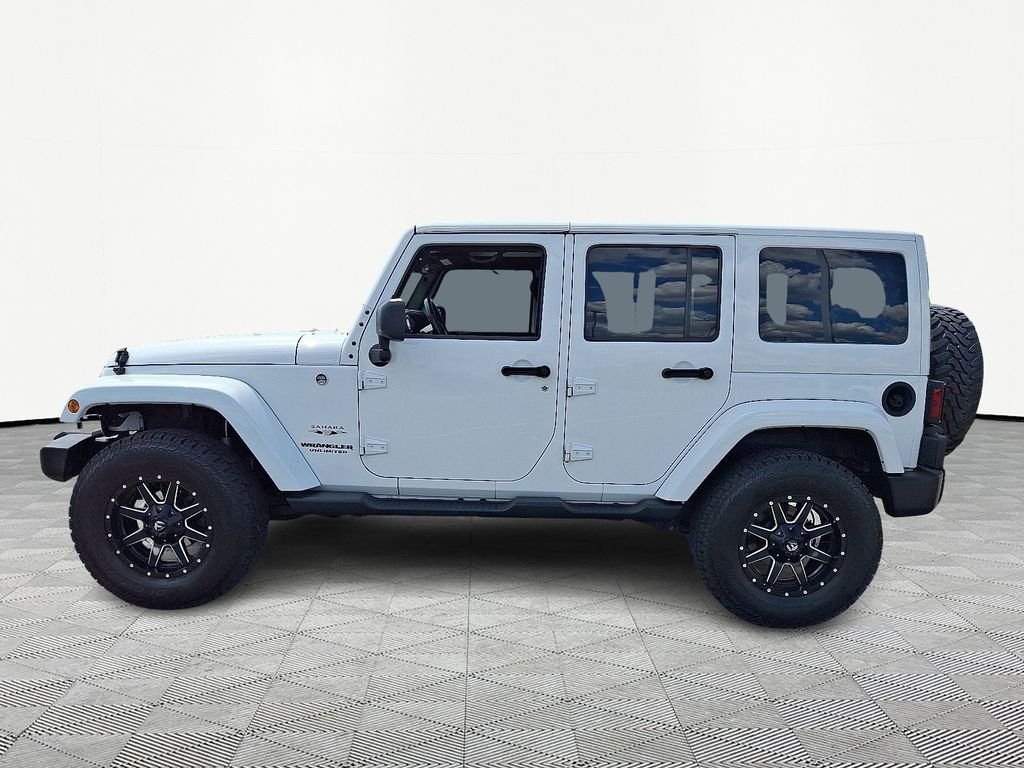 Used 2017 White Jeep Unlimited Sahara image 4