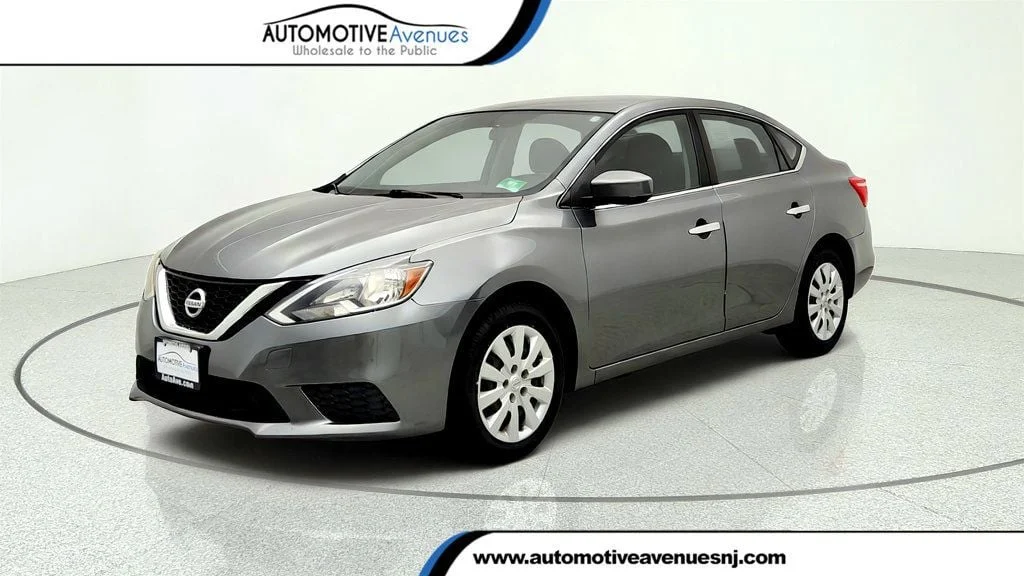 Used 2018 Gun Metallic Nissan S CVT image 1
