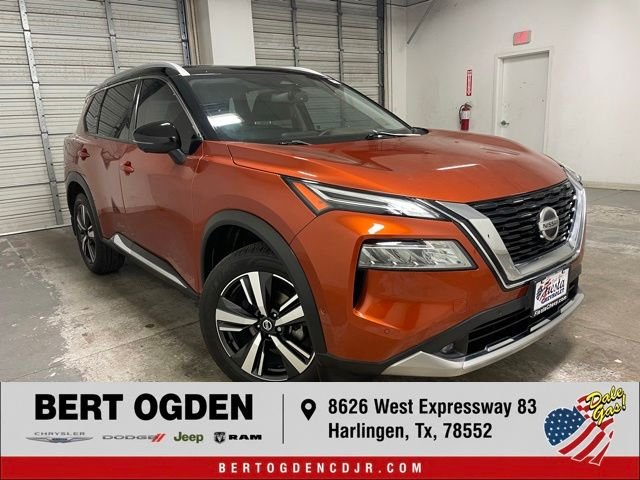Used 2021 Orange Nissan Platinum image 1