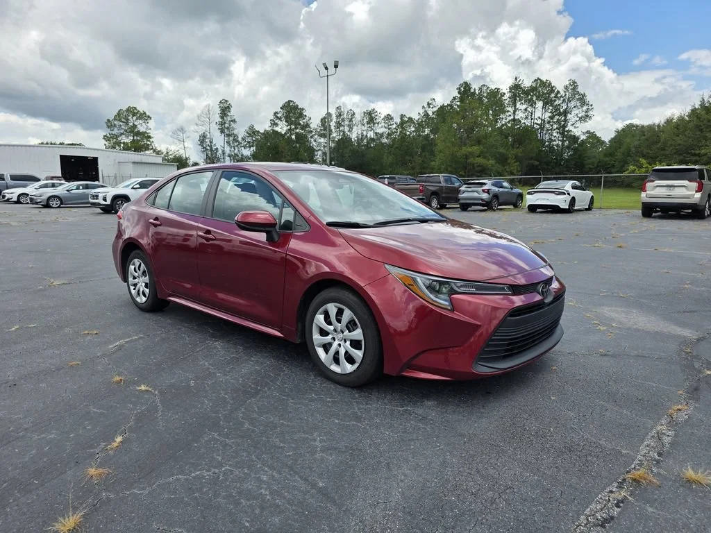Used 2024 Red Med Toyota LE image 4