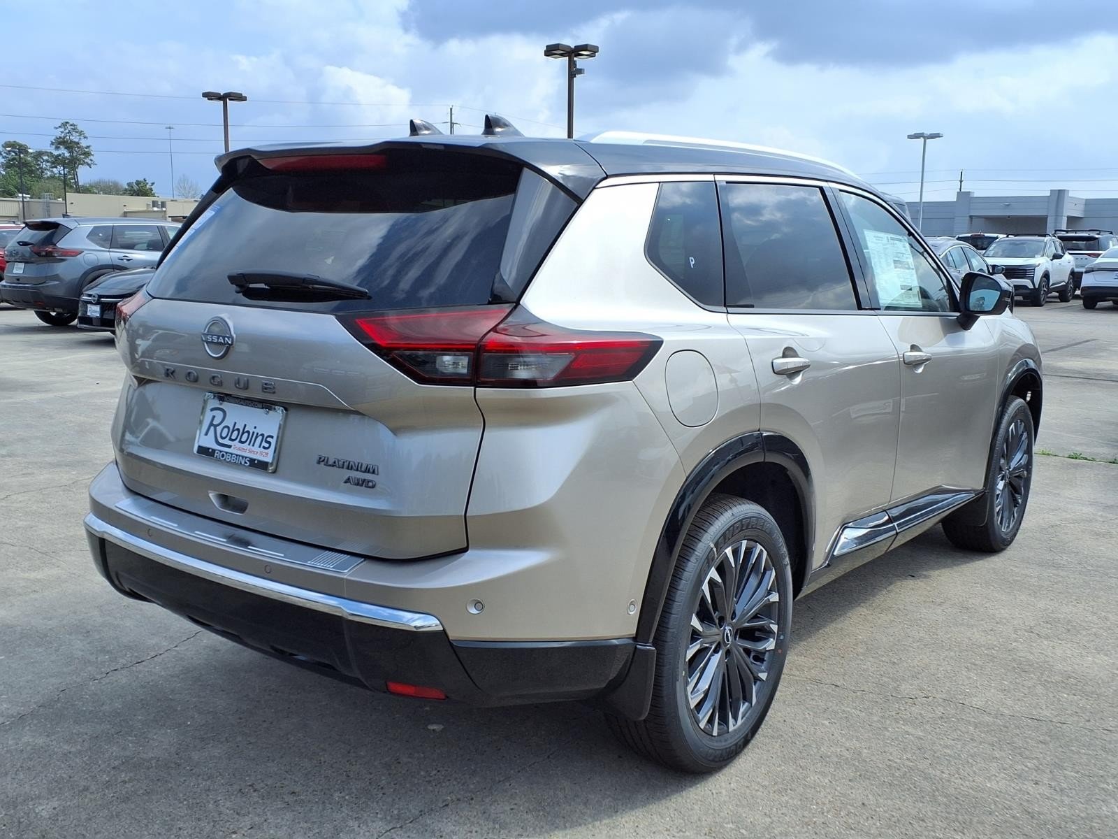 2026 Nissan Rogue Platinum Silver at Robbins Nissan