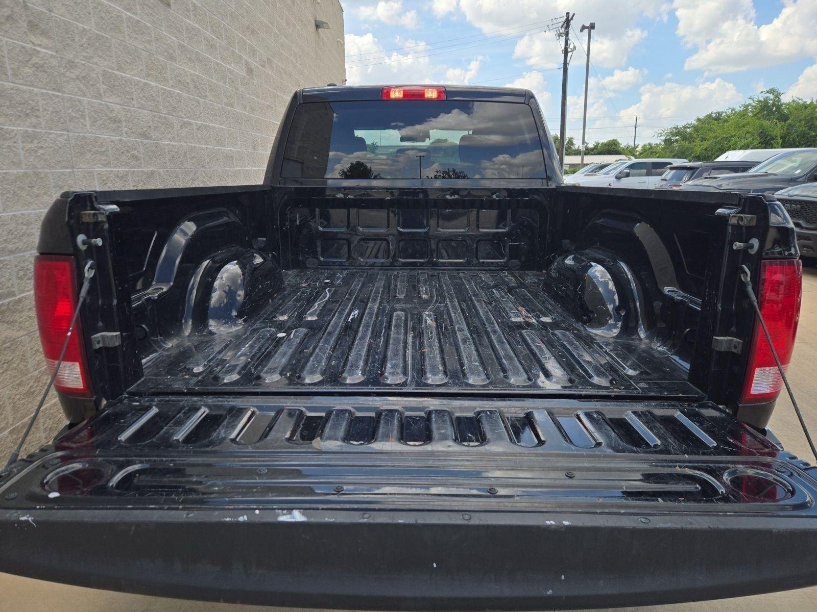 Used 2024 Diamond Black Crystal Pearlcoat Ram SLT image 25