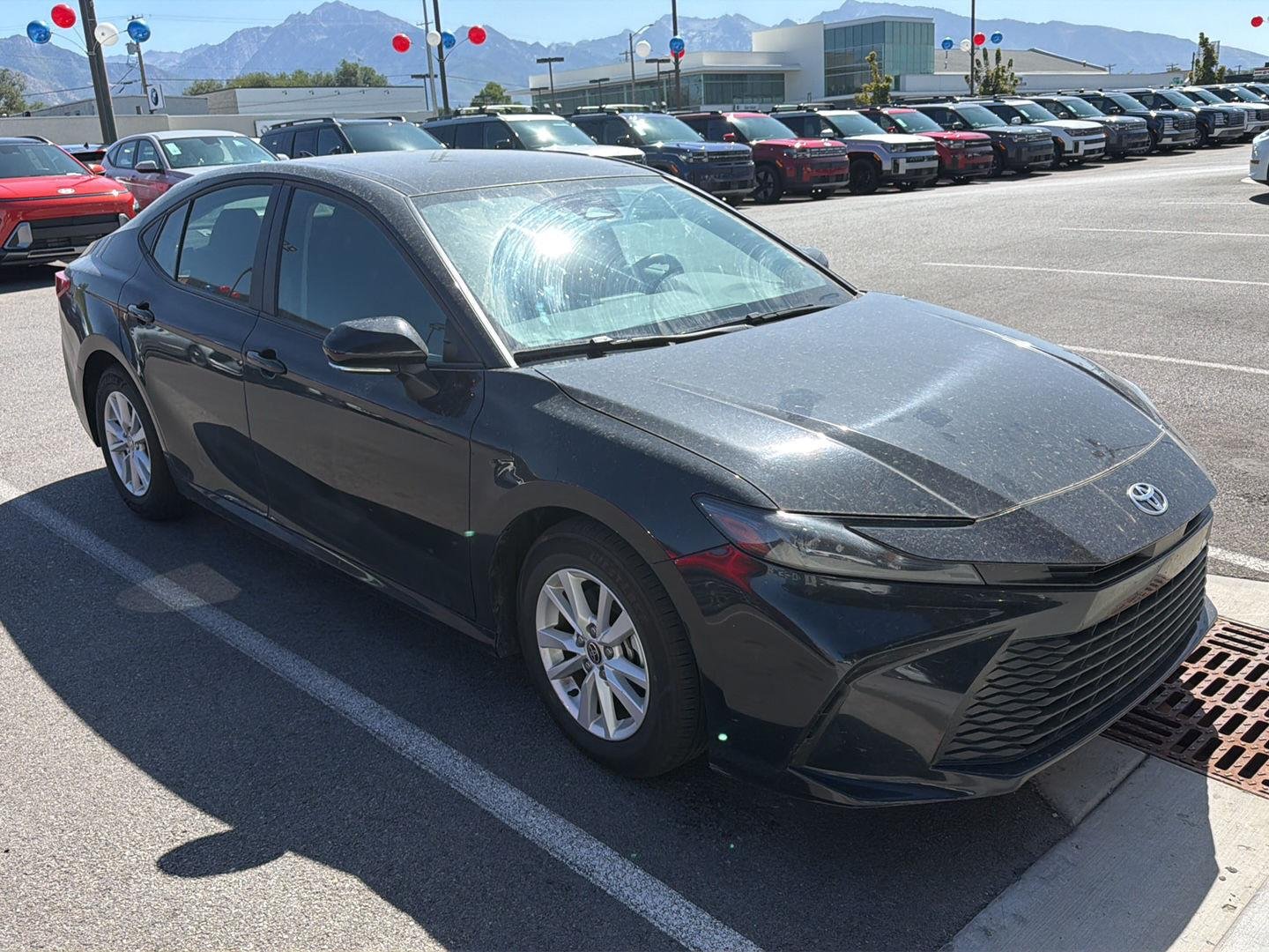 Used 2025 Midnight Black Metallic Toyota LE image 3