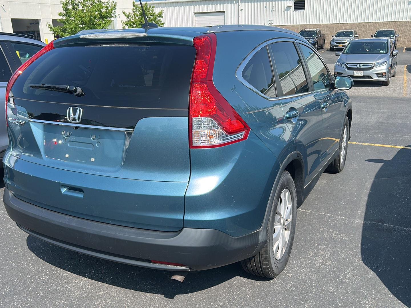 Used 2014 Twilight Blue Metallic Honda EX-L image 24