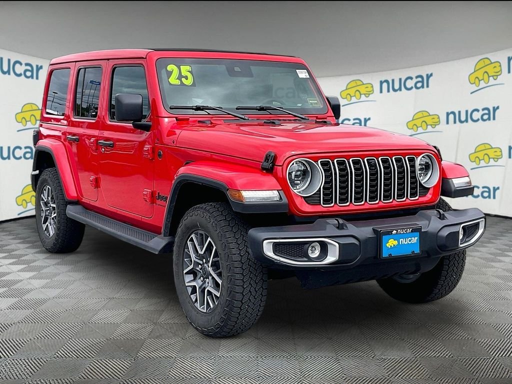 Used 2025 Firecracker Red Clearcoat Jeep Sahara image 1