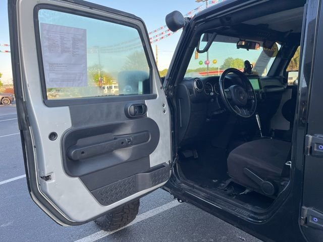 Used 2017 Black Jeep Unlimited Sport image 4