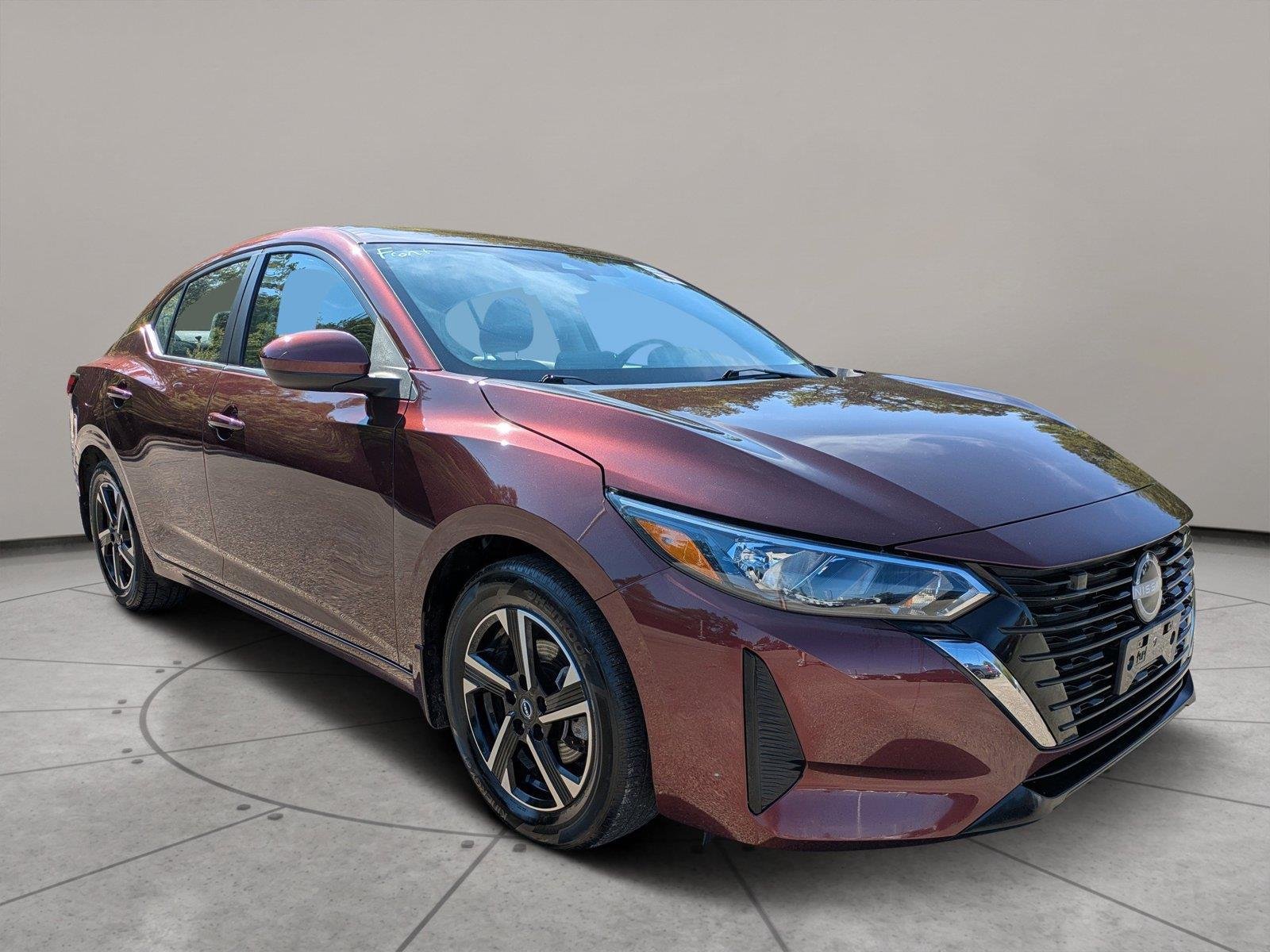 Used 2024 Rosewood Metallic Nissan SV image 1