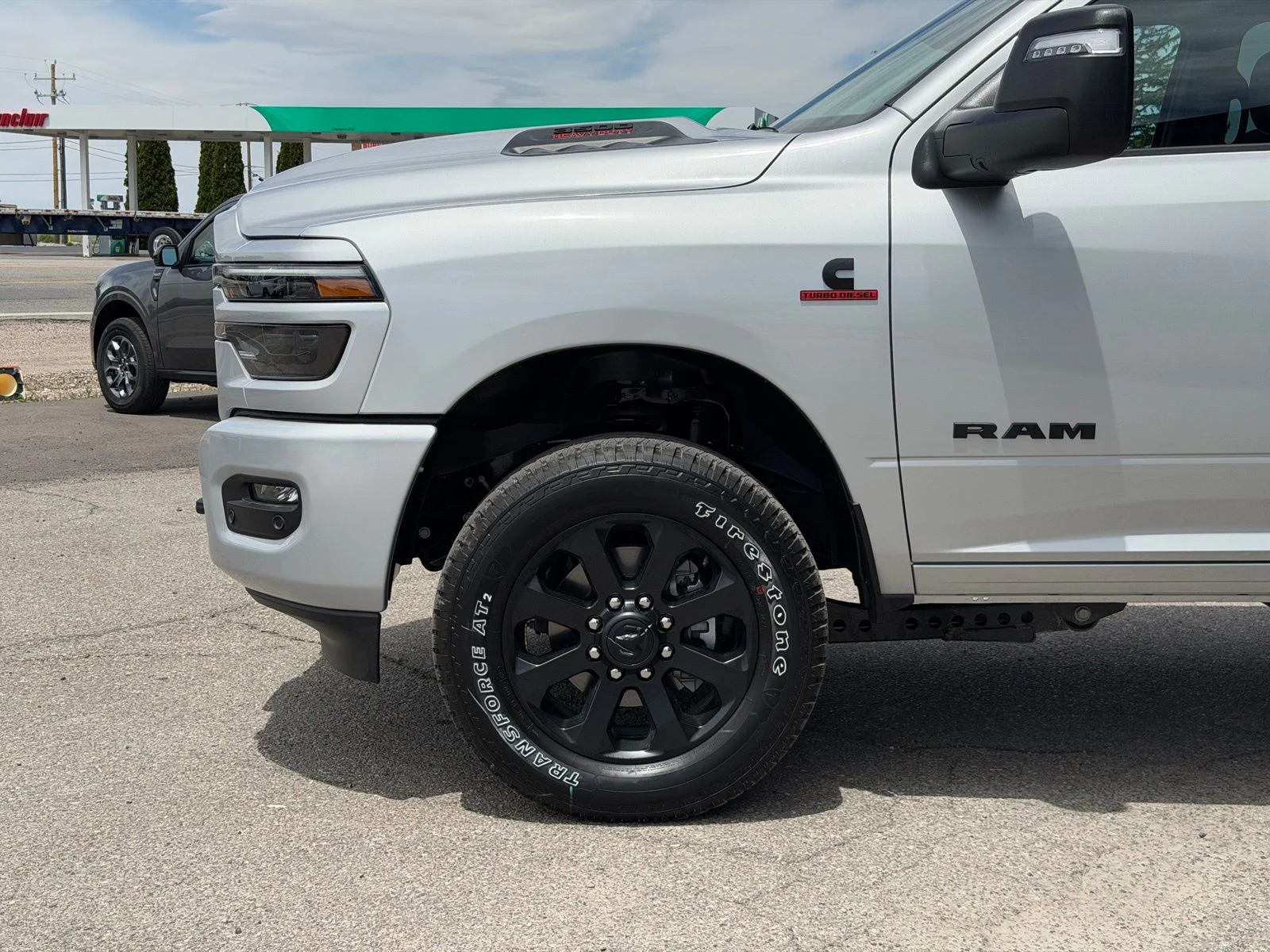 New 2026 Silver-Zynith Exterior Paint RAM Laramie image 12