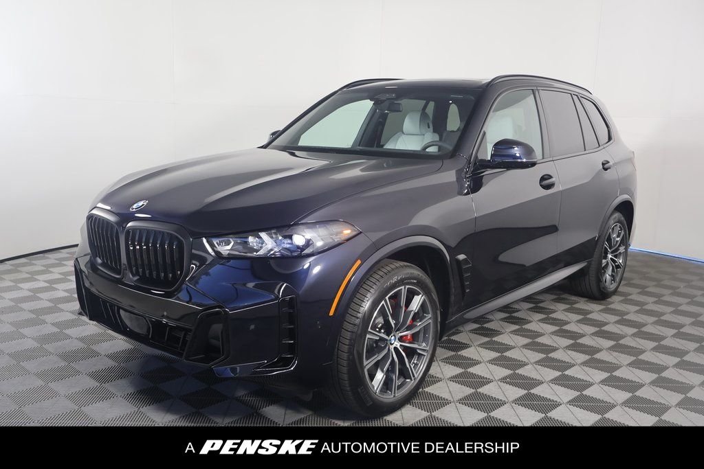 Used 2026 Carbon Black Metallic BMW xDrive40i image 1