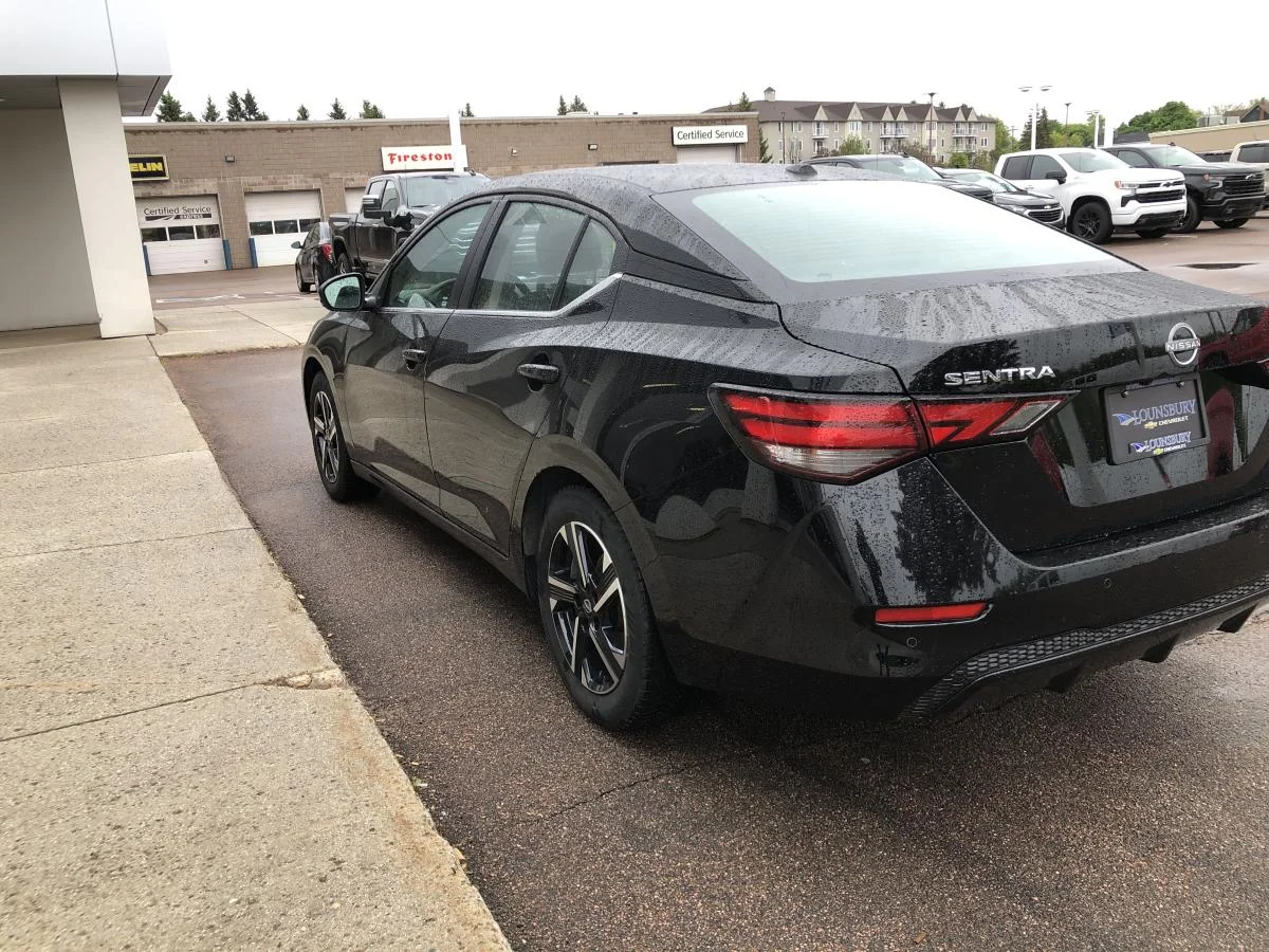 Used 2024 Black Nissan Sv Cvt image 5