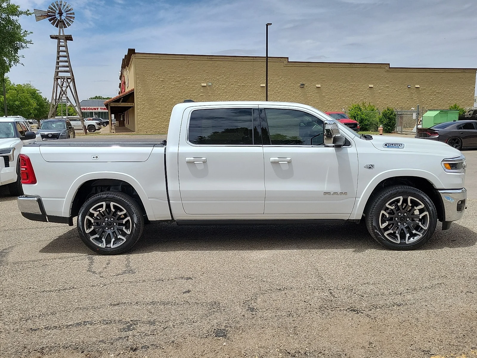New 2026 Bright White Ram LIMITED LONGHORN CREW CAB 4X4 5