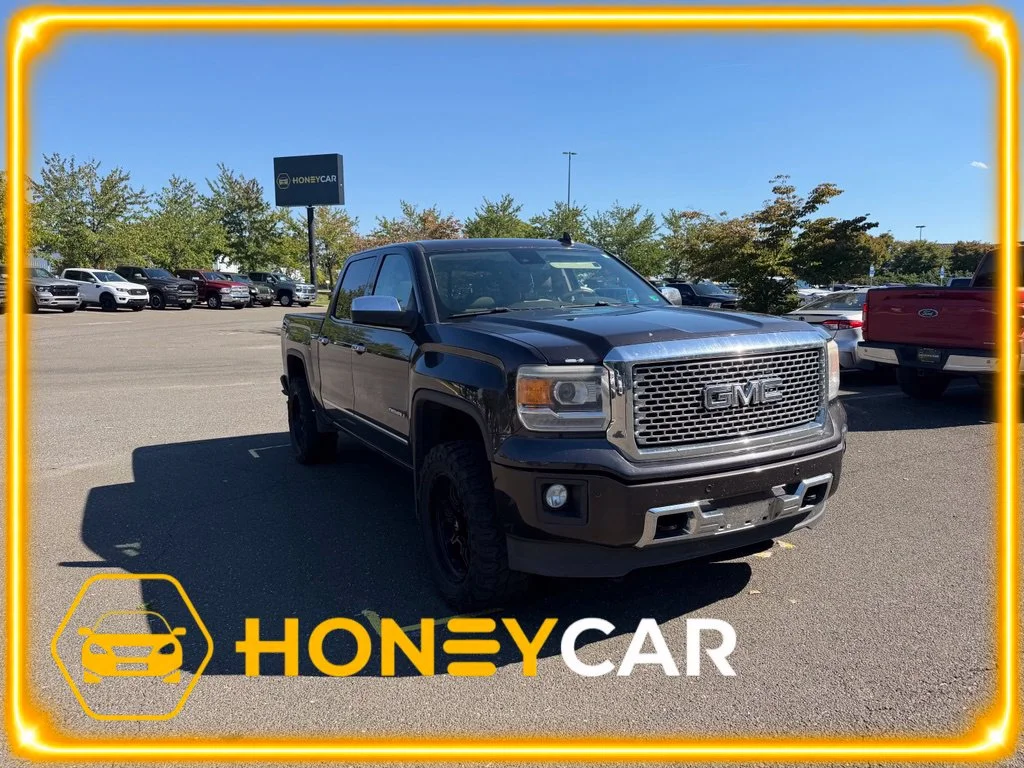 Used 2015 Silver GMC Denali image 1