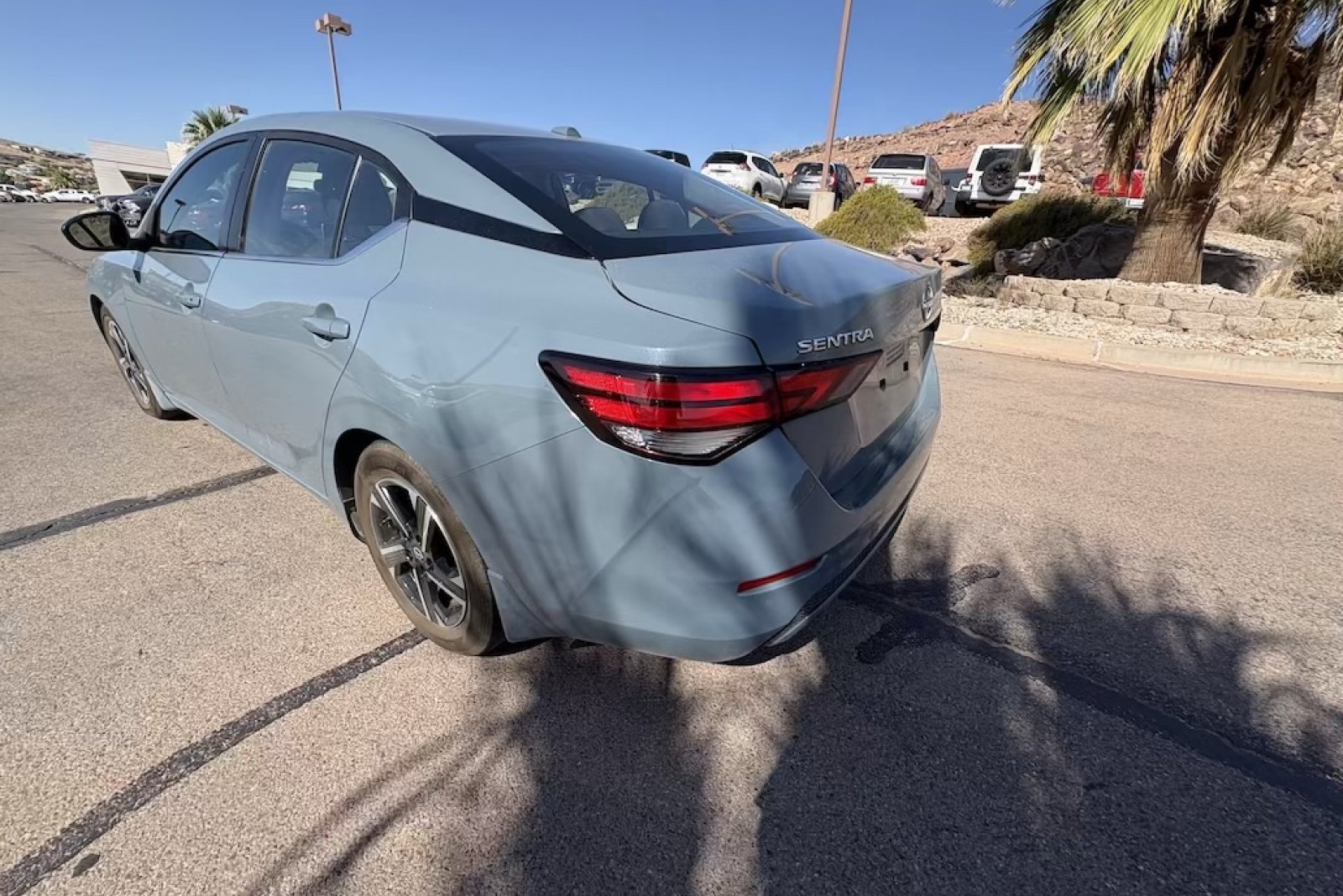Used 2025 Atlantic Gray Metallic Nissan SV image 3