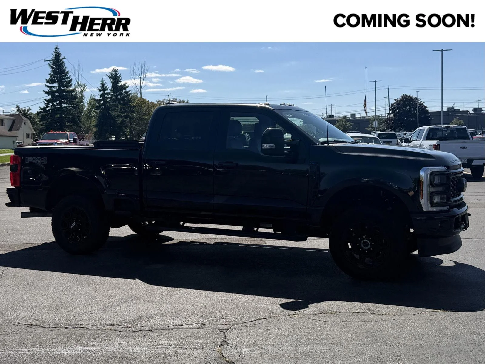 Used 2025 Agate Black Ford Lariat image 1