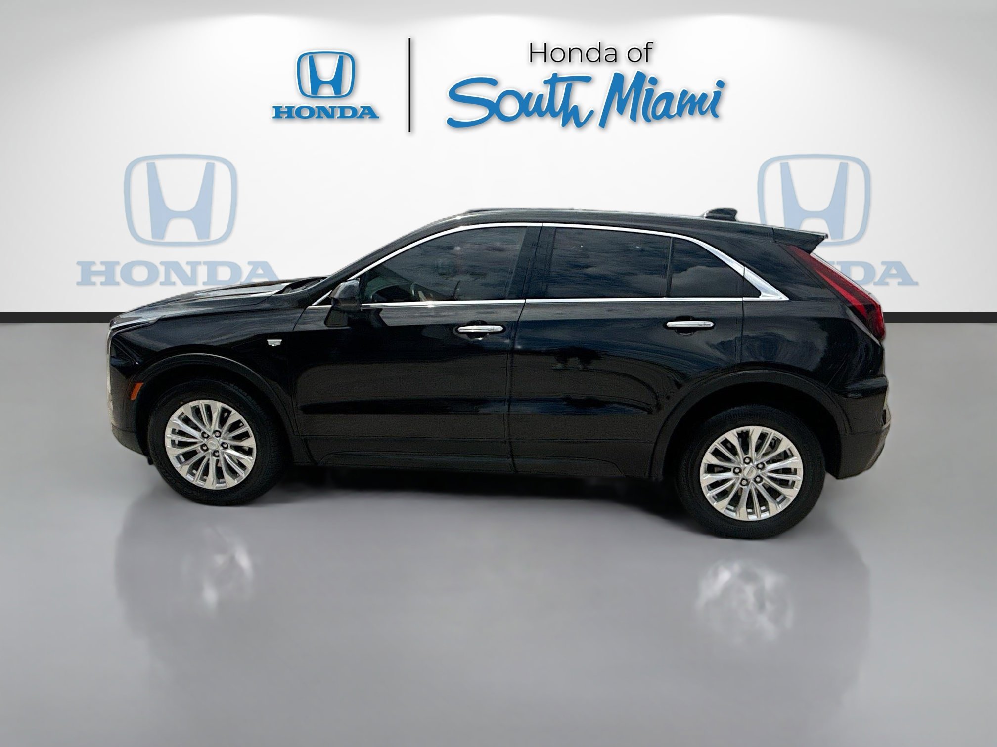 Used 2024 Stellar Black Metallic Cadillac FWD Luxury image 4