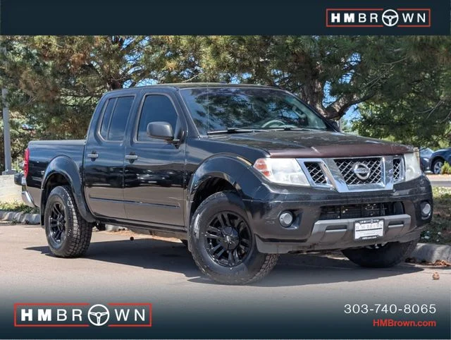 Used 2012 Super Black Nissan SV image 1