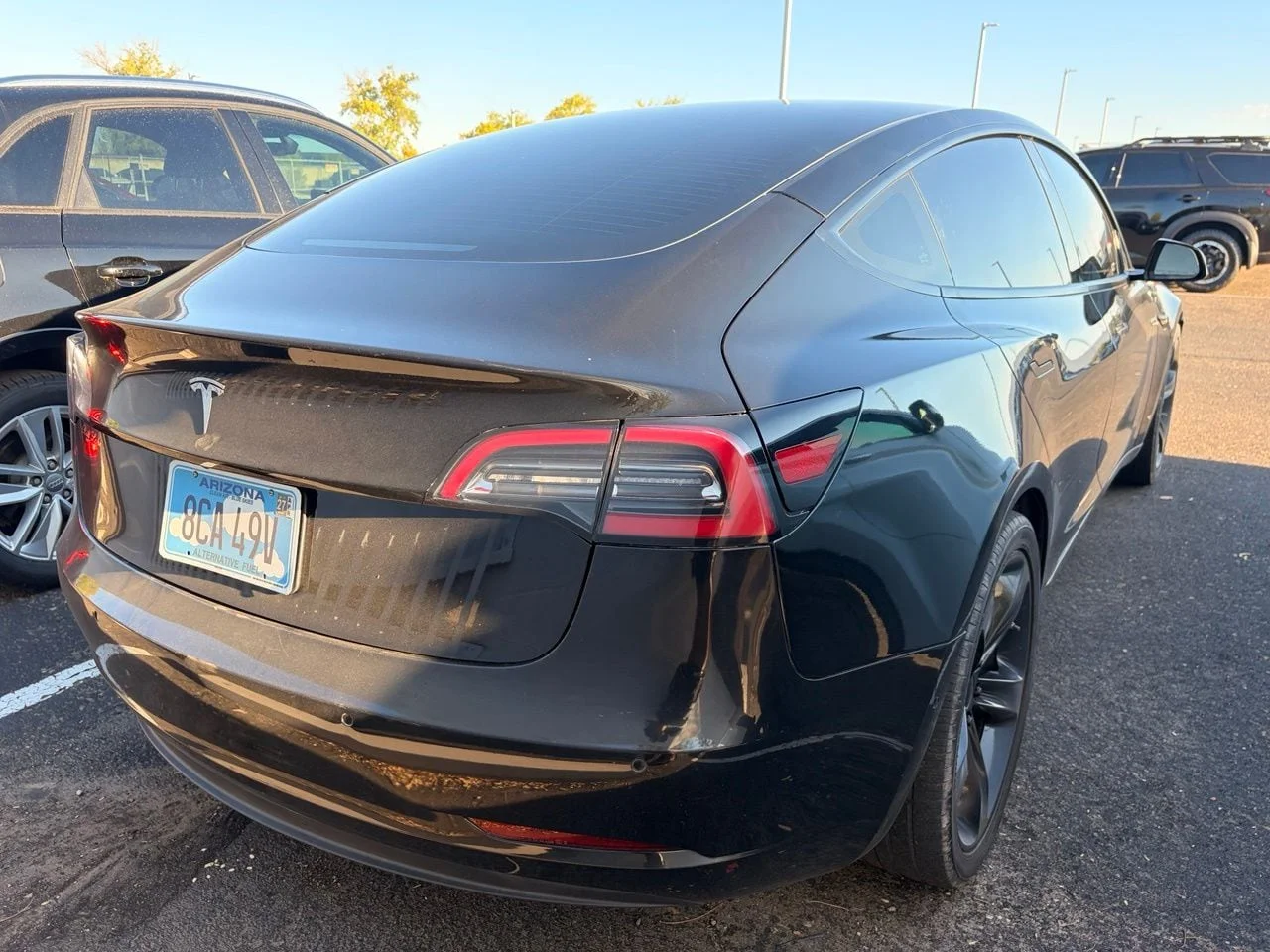 Used 2022 Solid Black Tesla Base image 5