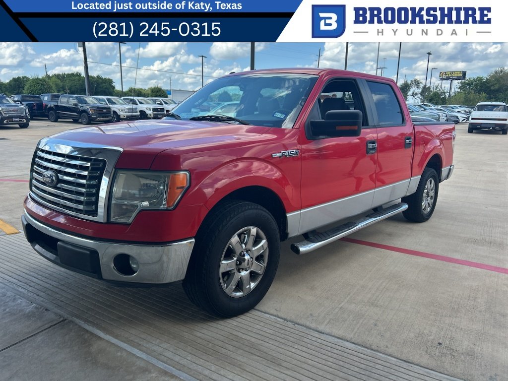 Used 2011 Race Red Ford XLT image 1