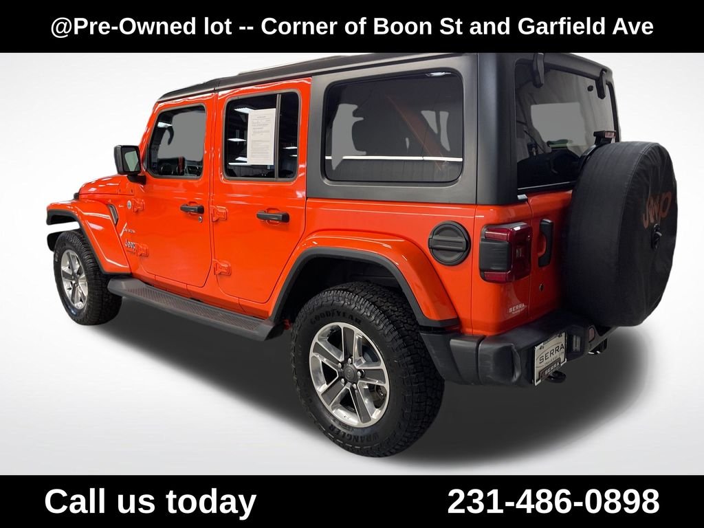 Used 2018 Orange Jeep Unlimited Sahara image 3