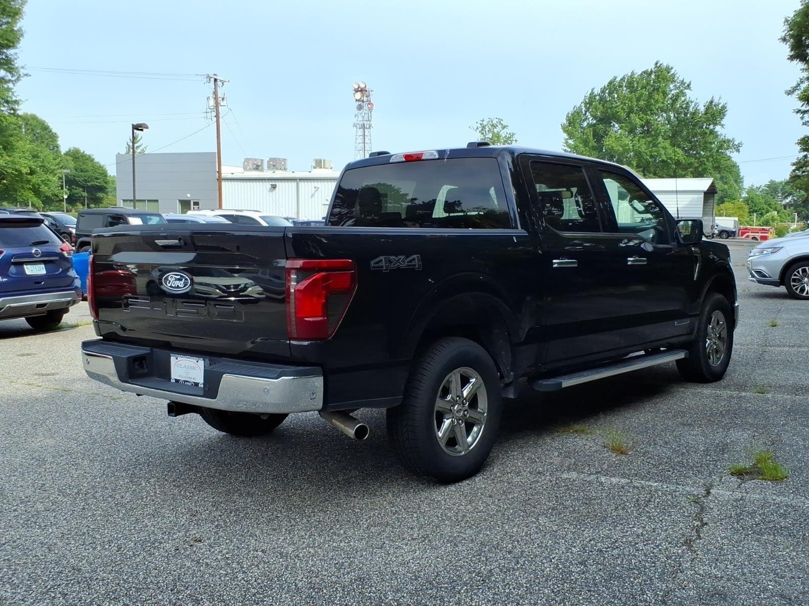 Used 2024 Agate Black Metallic Ford XLT image 6