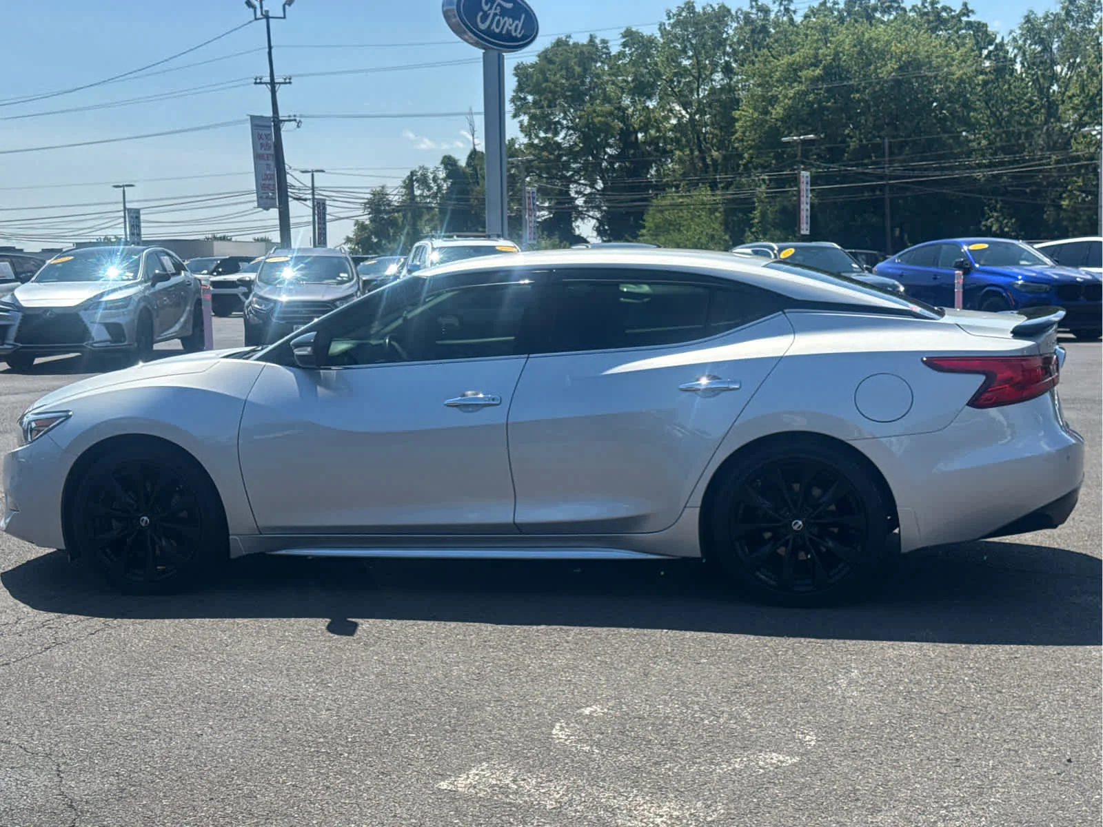 Used 2017 Brilliant Silver Nissan SR image 2