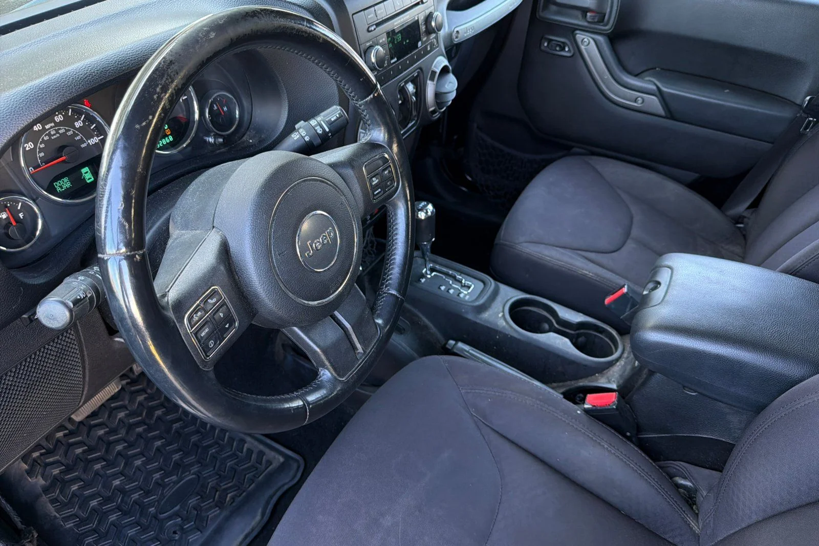Used 2013 Black Jeep Unlimited Sport image 12