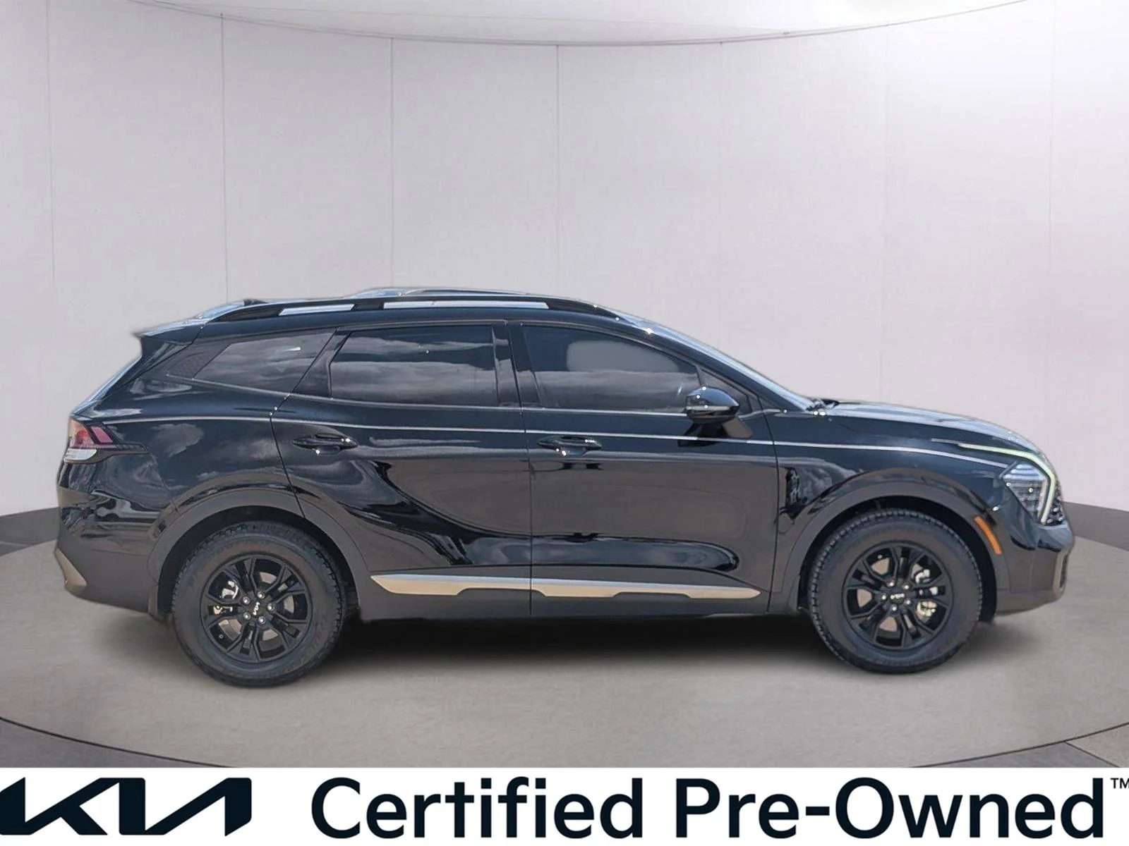 Used 2024 Ebony Black Kia X-Pro image 7