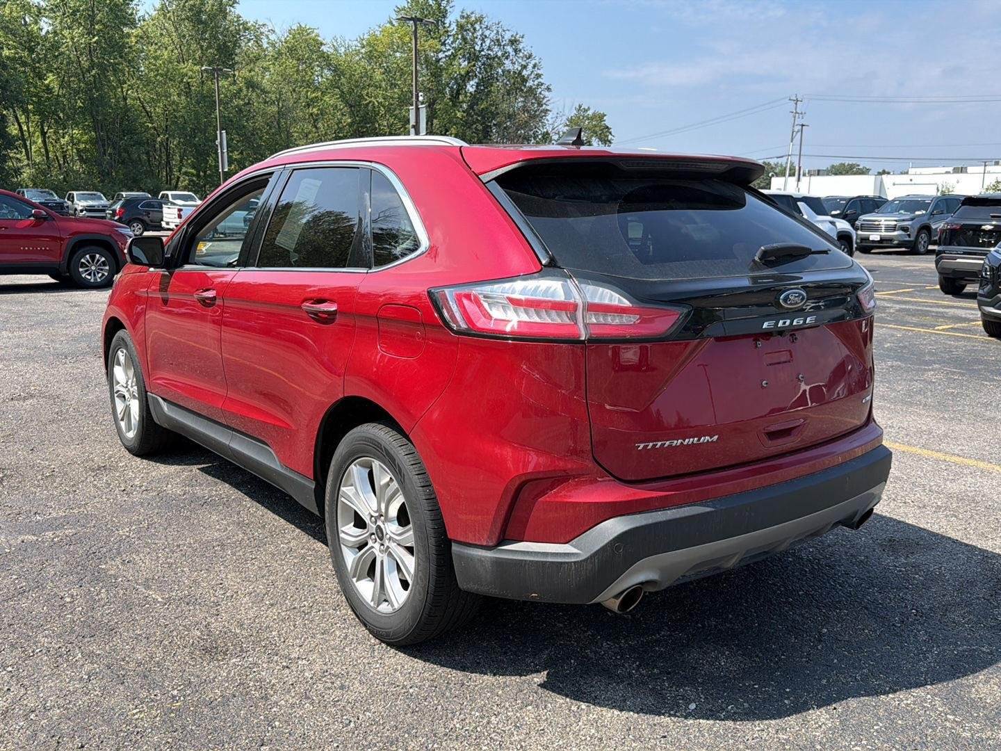 Used 2024 Rapid Red Metallic Tinted Clearcoat Ford Titanium image 5