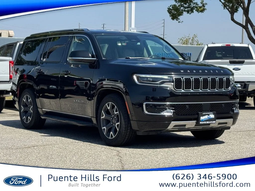 Used 2024 Black Jeep Series III image 1