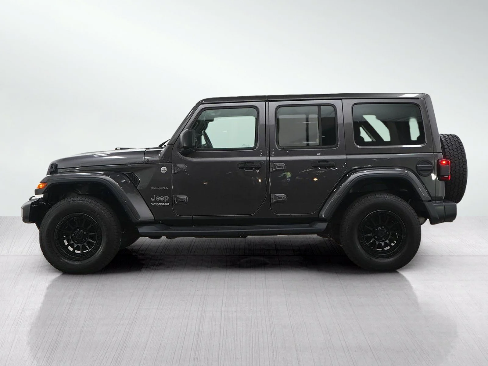 Used 2020 Jeep Wrangler Unlimited Sahara with VIN 1C4HJXEN6LW219009 for sale in Wayzata, Minnesota