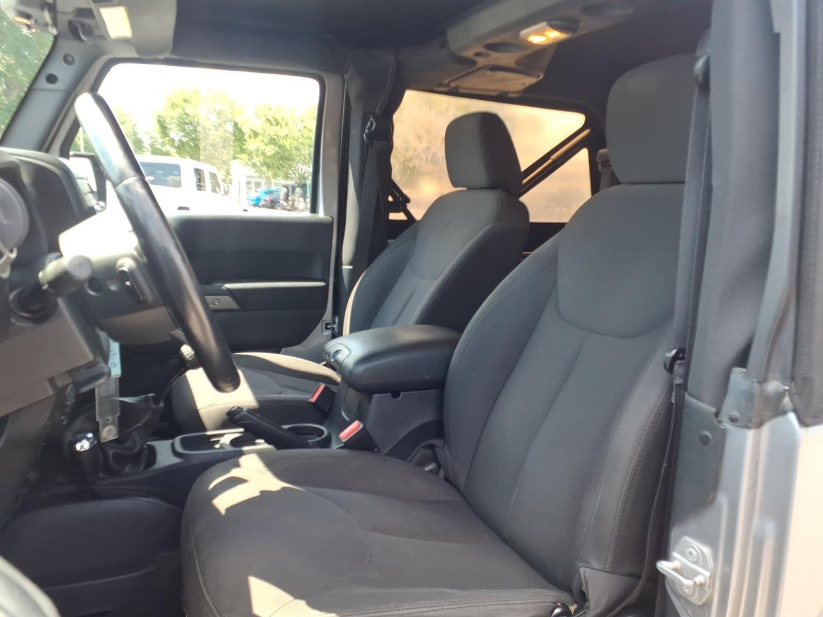 Used 2015 Billet Silver Metallic Clearcoat Jeep Sport image 17