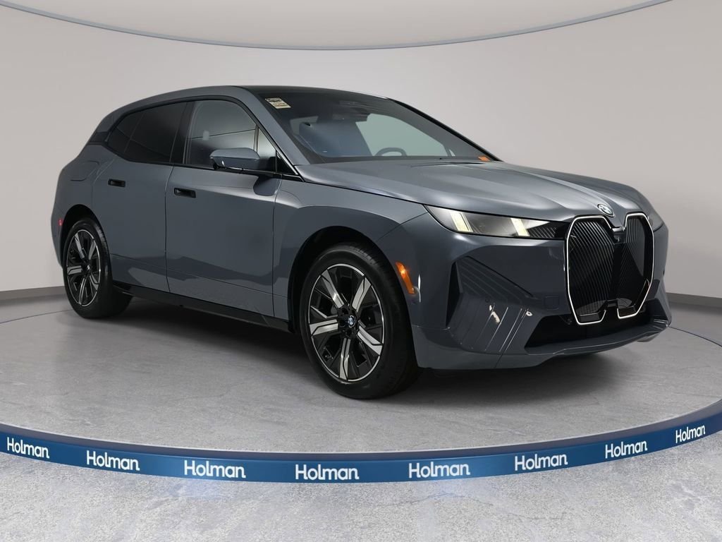 Used 2026 Storm Bay Metallic BMW xDrive60 image 3