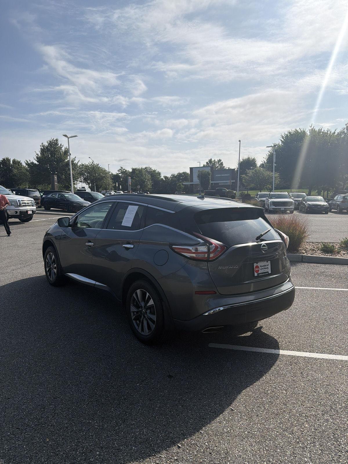 Used 2016 Gun Metallic Nissan SV image 11